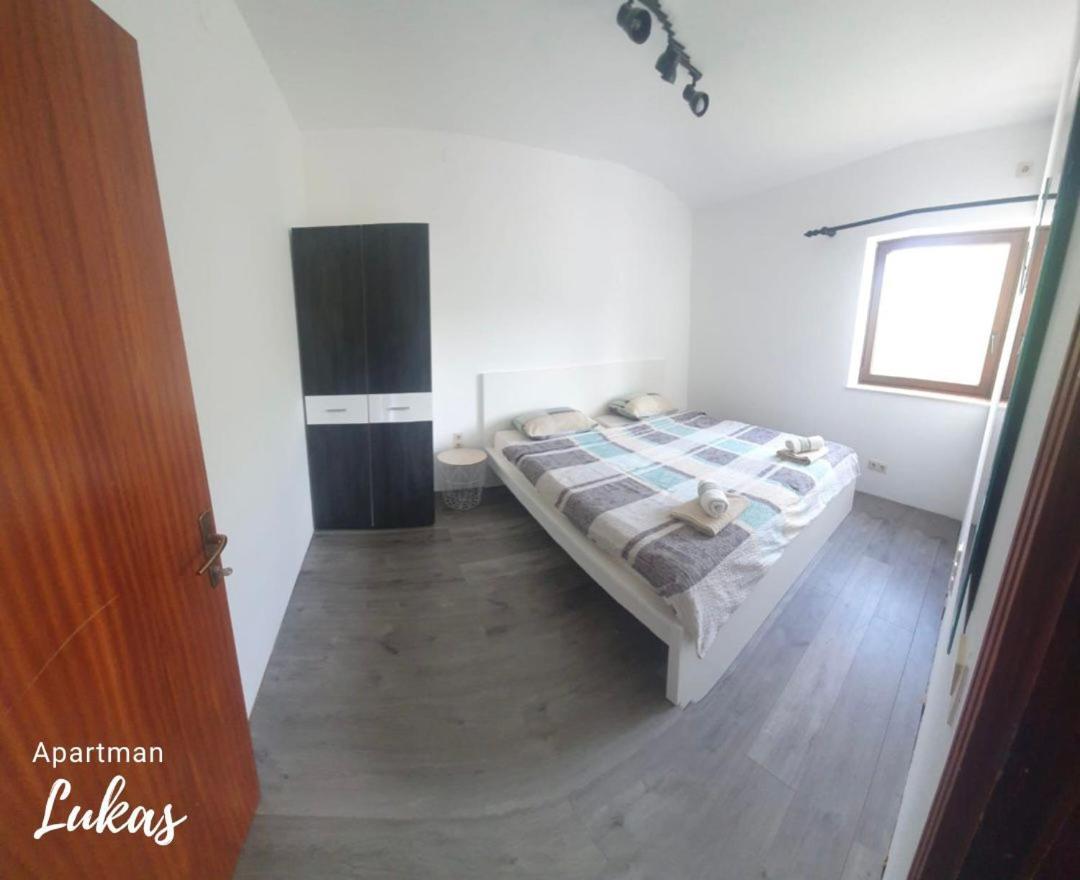 Apartmani Mazzarolli Jadranovo Rum bild