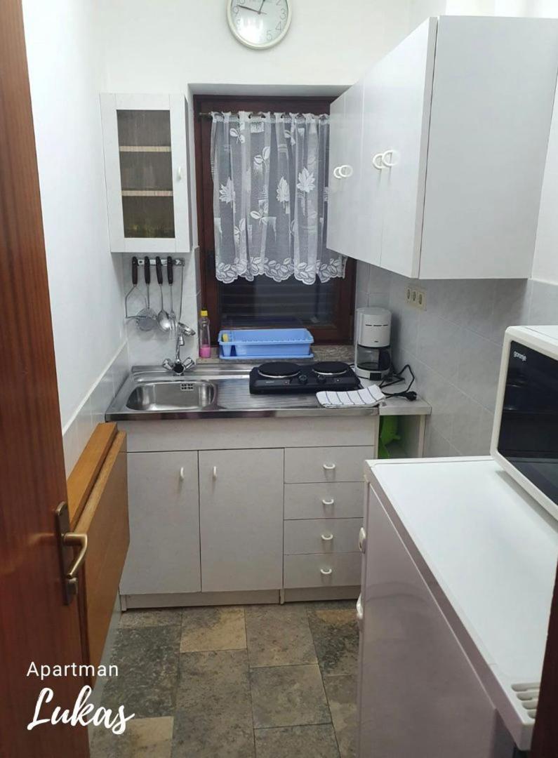 Apartmani Mazzarolli Jadranovo Rum bild